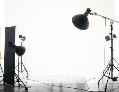 Photo of an empty photographic studio with modern lighting equipment