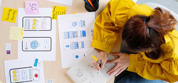 female ux designer working on mobile first user interface